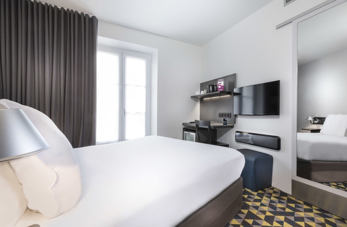 Imagen de la habitación del Hotel Libertel Montmartre Opéra. Foto 2