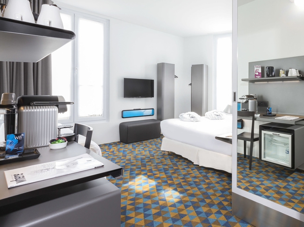 Imagen de la habitación del Hotel Libertel Montmartre Opéra. Foto 4