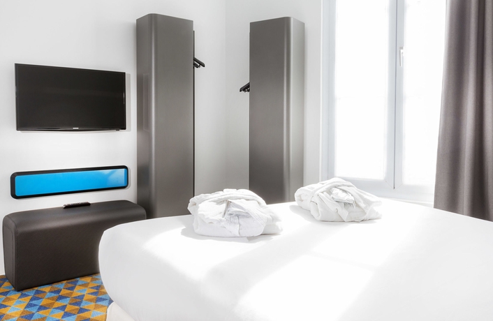 Imagen de la habitación del Hotel Libertel Montmartre Opéra. Foto 9