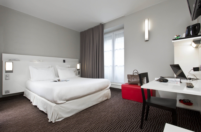 Imagen de la habitación del Hotel Libertel Montmartre Opéra. Foto 12