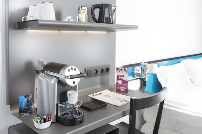 Imagen de la habitación del Hotel Libertel Montmartre Opéra. Foto 13