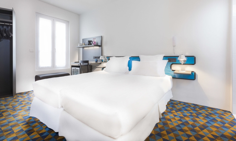 Imagen de la habitación del Hotel Libertel Montmartre Opéra. Foto 14