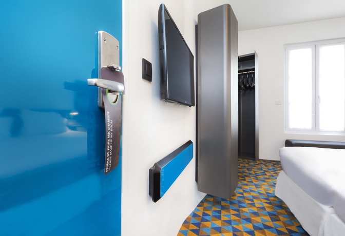 Imagen de la habitación del Hotel Libertel Montmartre Opéra. Foto 15