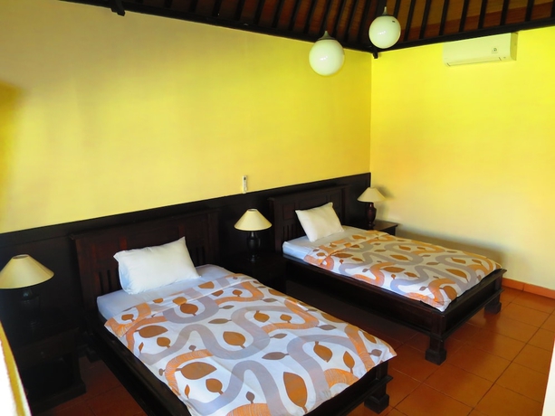 Imagen de la habitación del Hotel Liberty Dive Resort. Foto 10