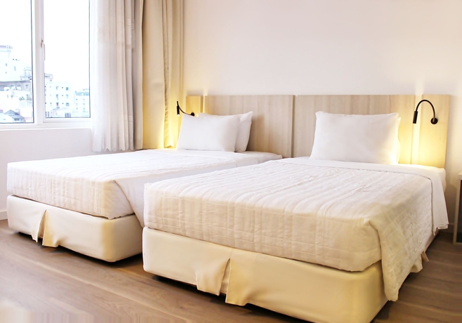 Imagen de la habitación del Hotel Liberty Saigon Greenview. Foto 2