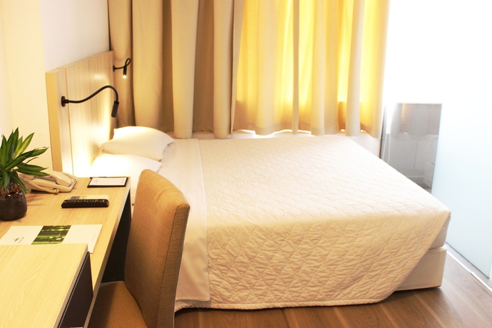 Imagen de la habitación del Hotel Liberty Saigon Greenview. Foto 6