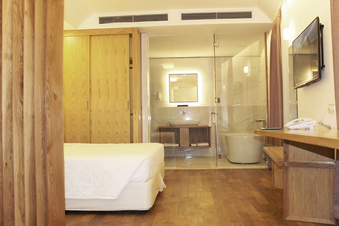 Imagen de la habitación del Hotel Liberty Saigon Greenview. Foto 12