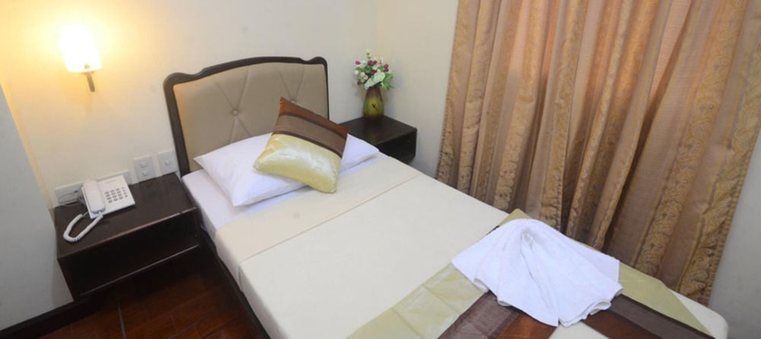 Imagen de la habitación del Hotel Libis Bayview. Foto 9