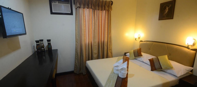 Imagen de la habitación del Hotel Libis Bayview. Foto 10