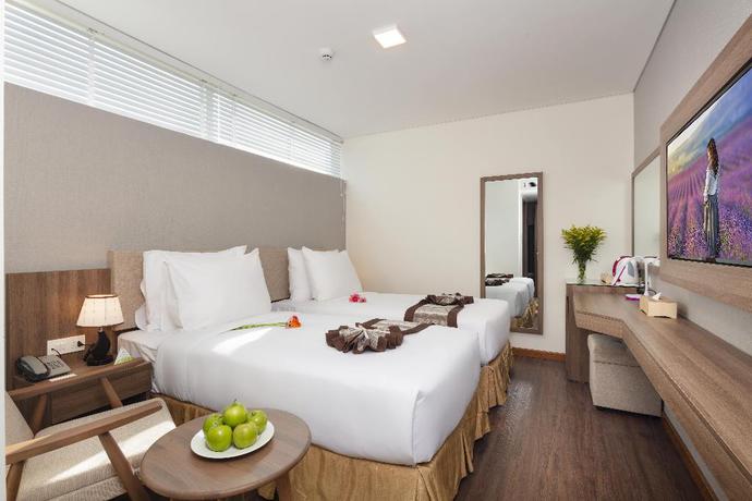 Imagen de la habitación del Hotel Libra Nha Trang. Foto 17