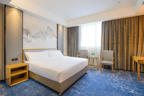 Imagen de la habitación del Hotel Licheng Langyue - Huizhou Huicheng Shuikou Branch. Foto 15