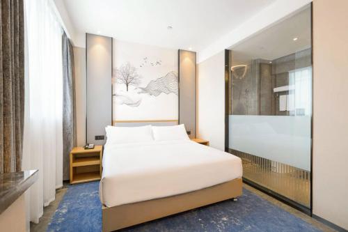 Imagen de la habitación del Hotel Licheng Langyue - Huizhou Huicheng Shuikou Branch. Foto 16