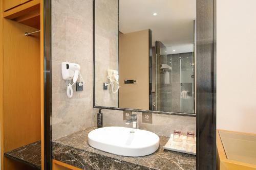 Imagen de la habitación del Hotel Licheng Langyue - Huizhou Huicheng Shuikou Branch. Foto 17