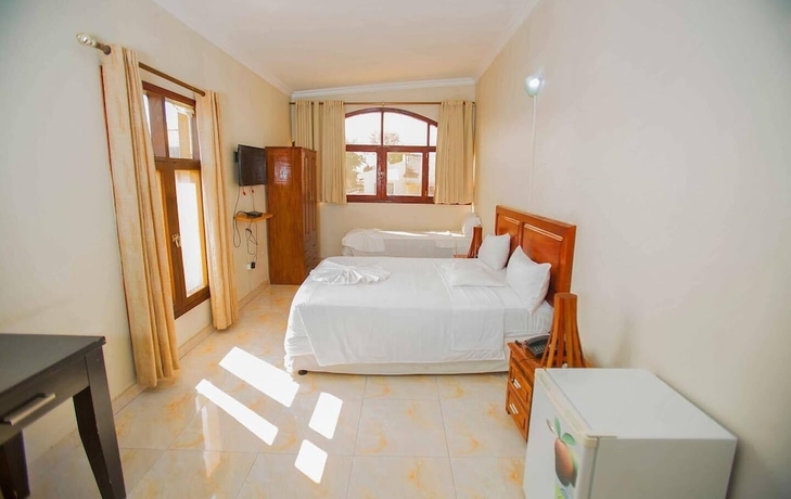 Imagen de la habitación del Hotel Lidias Guest House. Foto 7