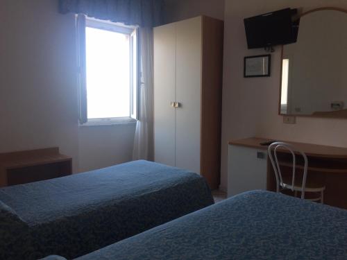 Imagen de la habitación del Hotel Lido, Follonica. Foto 10