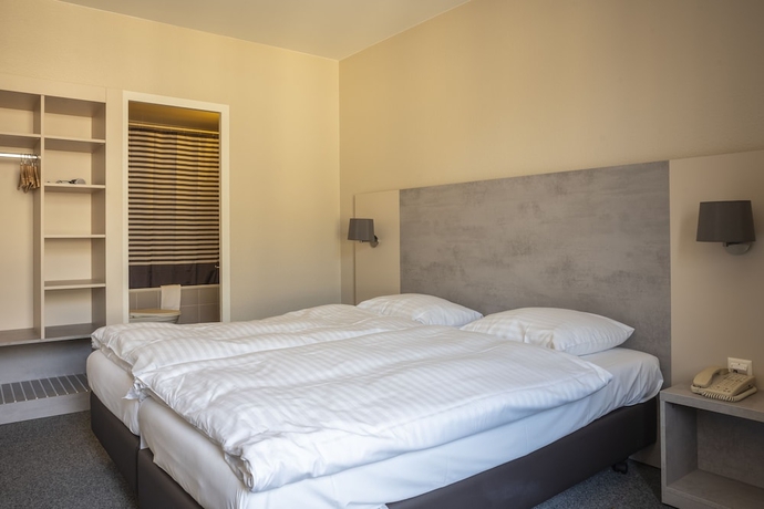 Imagen de la habitación del Hotel Lido, Ginebra. Foto 7