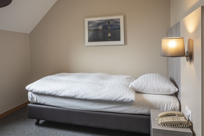 Imagen de la habitación del Hotel Lido, Ginebra. Foto 16