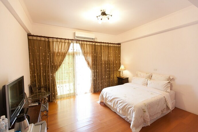 Imagen de la habitación del Hotel Lidu Homestay. Foto 20