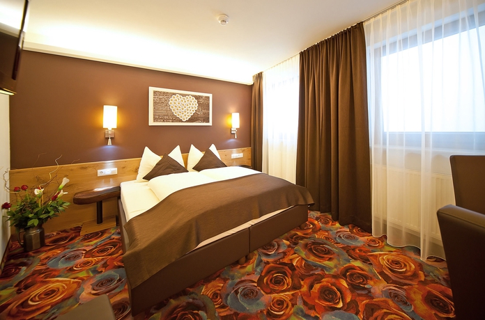 Imagen de la habitación del Hotel Lieblingsplatz Tirolerhof. Foto 8