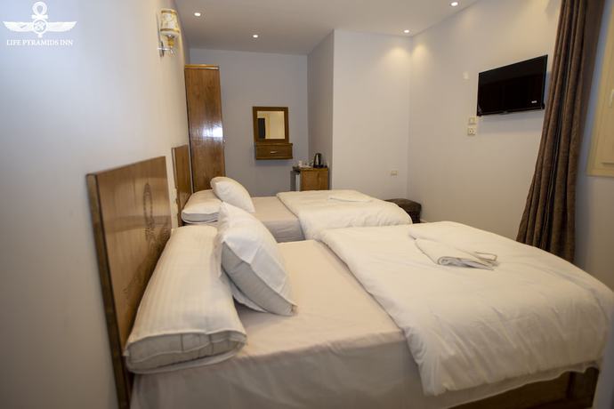 Imagen de la habitación del Hotel Life Pyramids Inn. Foto 4