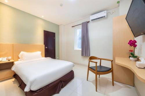 Imagen de la habitación del Hotel Life Soekarno Hatta Makassar. Foto 17