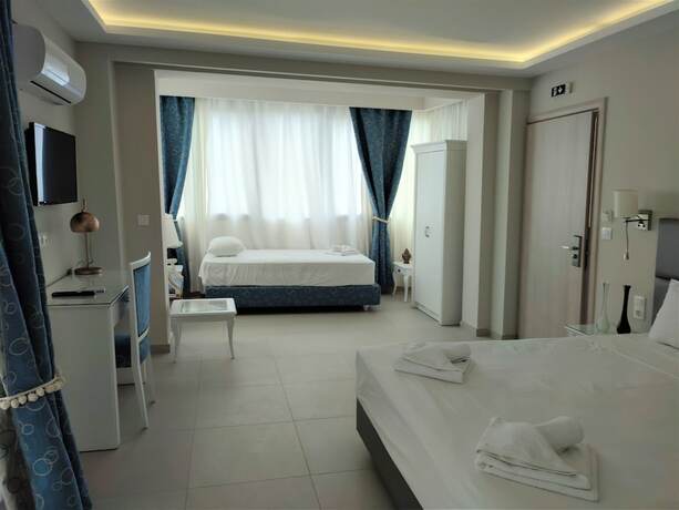 Imagen de la habitación del Hotel Light Blue Luxury Rooms. Foto 12