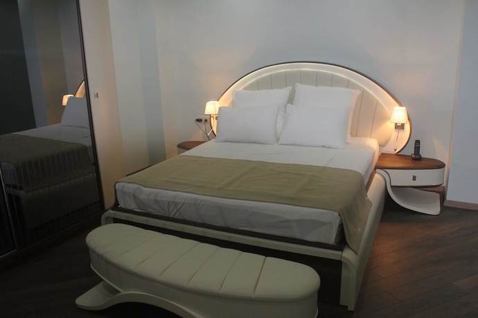 Imagen de la habitación del Hotel Light Palace. Foto 14