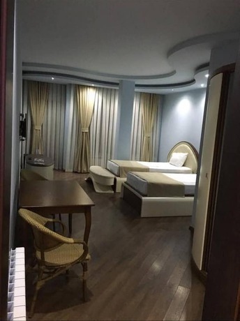 Imagen de la habitación del Hotel Light Palace. Foto 15