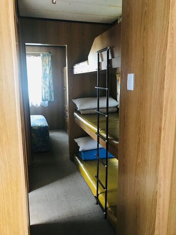 Imagen de la habitación del Hotel Lighthouse Beach Holiday Village. Foto 17