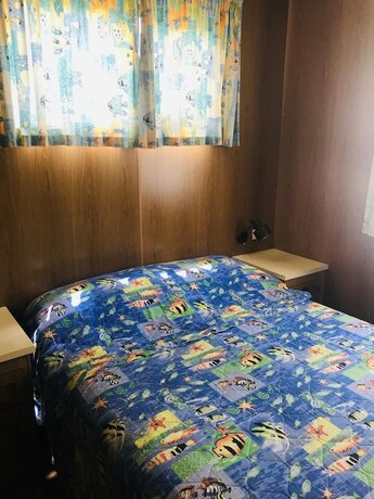 Imagen de la habitación del Hotel Lighthouse Beach Holiday Village. Foto 20