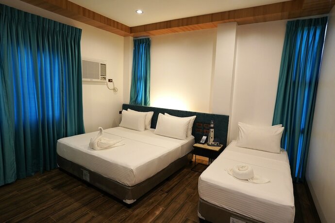 Imagen de la habitación del Hotel Lighthouse Point, Dumaguete. Foto 12