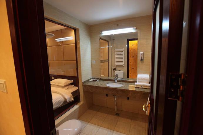 Imagen de la habitación del Hotel Lihao Airport Guo Zhan. Foto 15