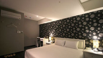 Imagen de la habitación del Hotel Lihao, Taipei. Foto 1