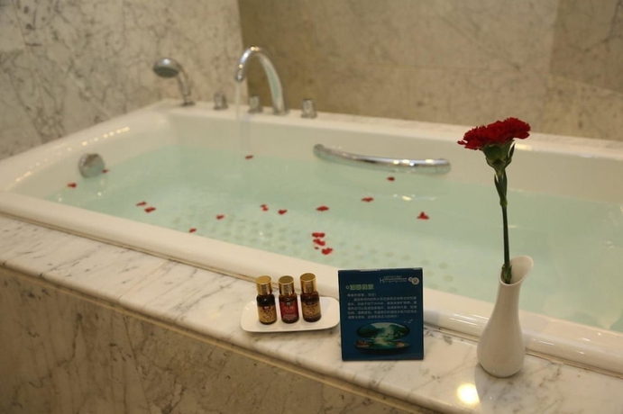 Imagen de la habitación del Hotel Lihua Grand. Foto 3