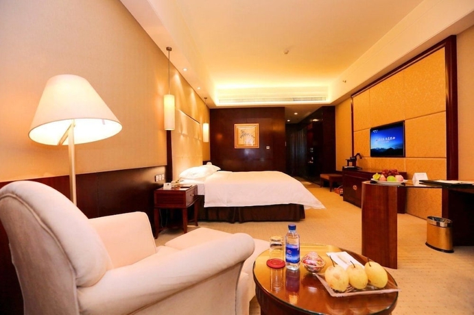 Imagen de la habitación del Hotel Lihua Grand. Foto 5
