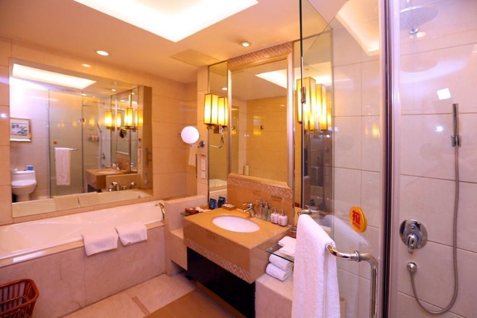 Imagen de la habitación del Hotel Lihua Grand. Foto 7