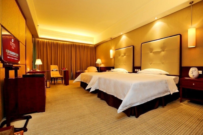 Imagen de la habitación del Hotel Lihua Grand. Foto 8