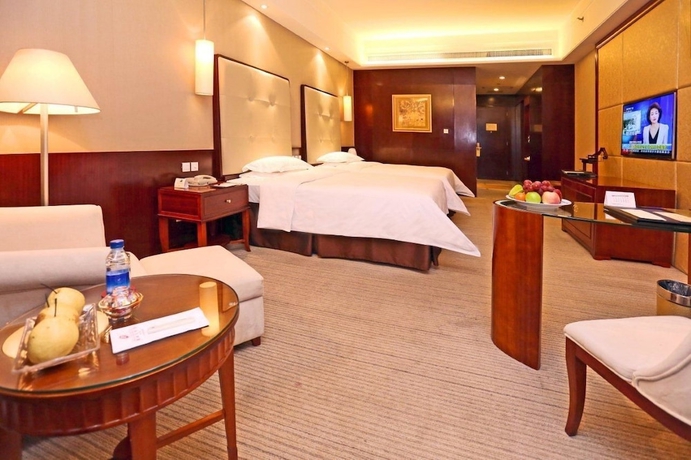 Imagen de la habitación del Hotel Lihua Grand. Foto 9