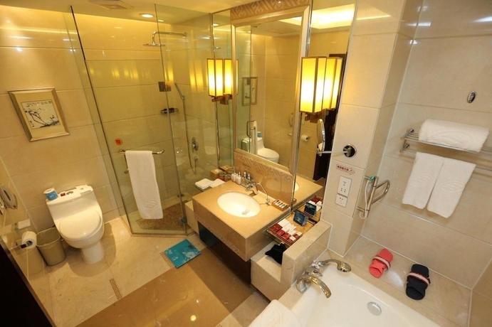 Imagen de la habitación del Hotel Lihua Grand. Foto 10