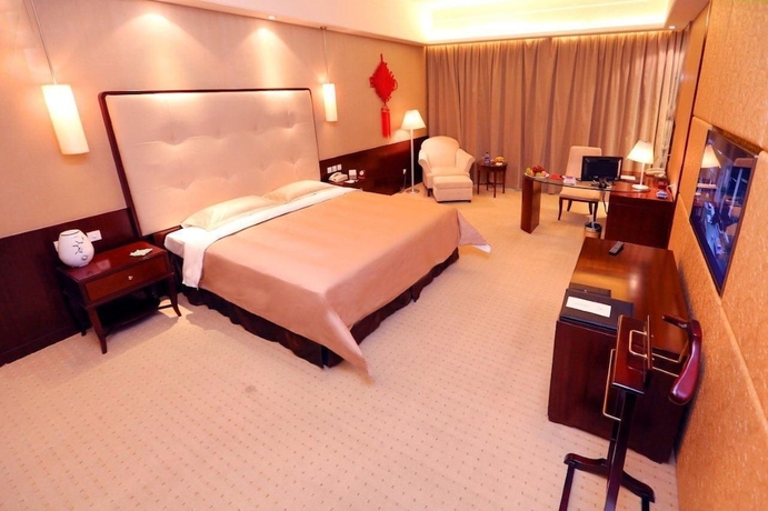 Imagen de la habitación del Hotel Lihua Grand. Foto 12