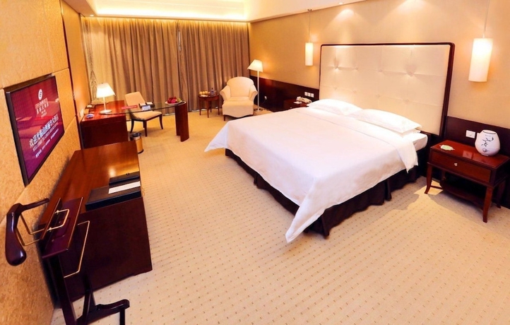 Imagen de la habitación del Hotel Lihua Grand. Foto 13