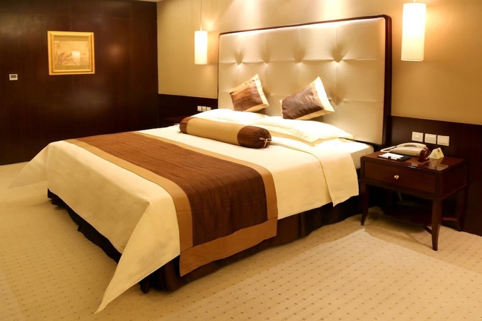 Imagen de la habitación del Hotel Lihua Grand. Foto 15