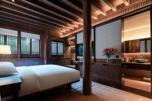 Imagen de la habitación del Hotel Lijiang Ancient City Anyu. Foto 18