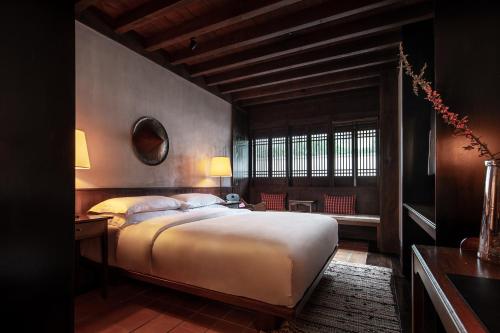 Imagen de la habitación del Hotel Lijiang Ancient City Anyu. Foto 20