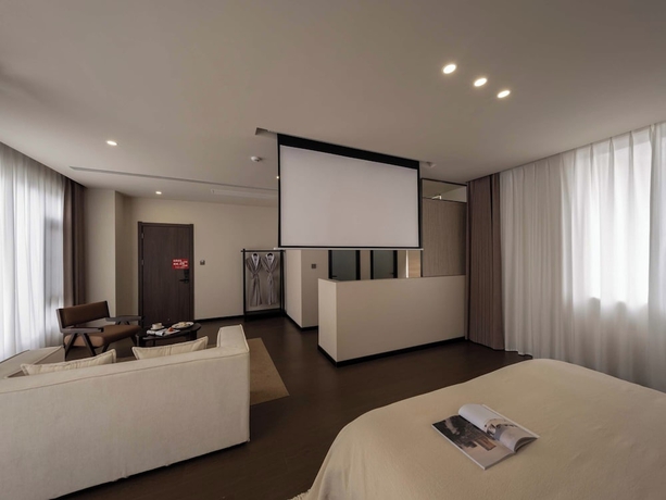 Imagen de la habitación del Hotel Lijiang Ancient City Hitone Resort. Foto 5