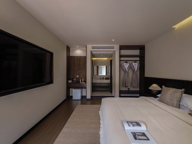Imagen de la habitación del Hotel Lijiang Ancient City Hitone Resort. Foto 12