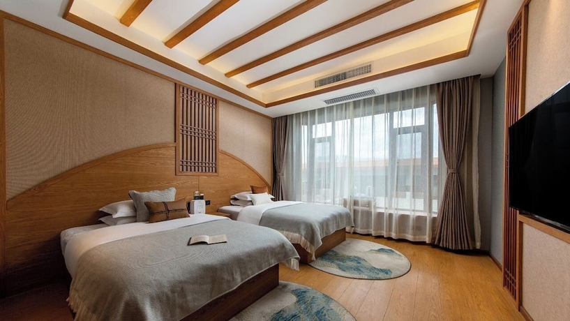 Imagen de la habitación del Hotel Lijiang Ancient Town Nanzhuang Inn. Foto 10