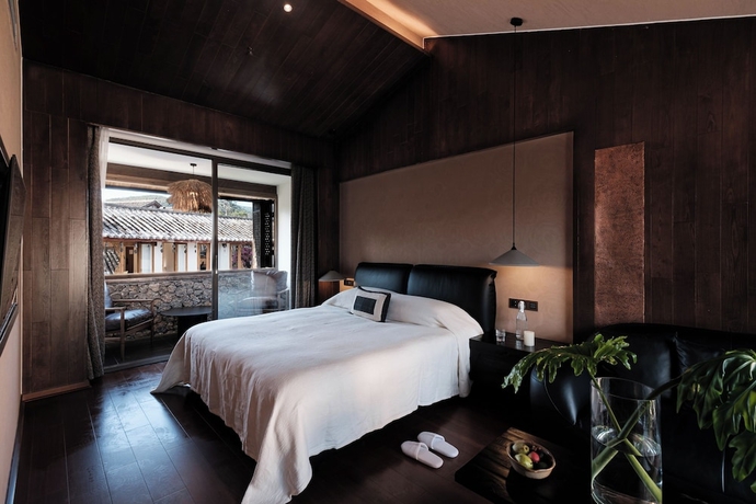 Imagen de la habitación del Hotel Lijiang Ancient Town TianDe Grande. Foto 8
