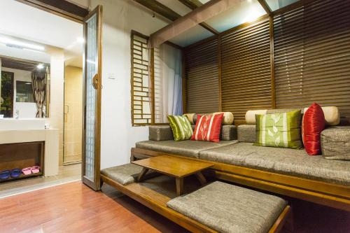 Imagen de la habitación del Hotel Lijiang Emerald Boutique. Foto 7