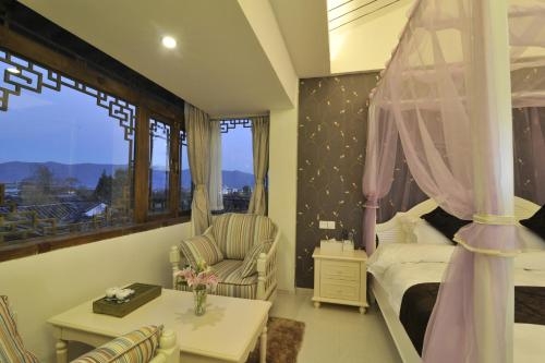Imagen de la habitación del Hotel Lijiang Emerald Boutique. Foto 8